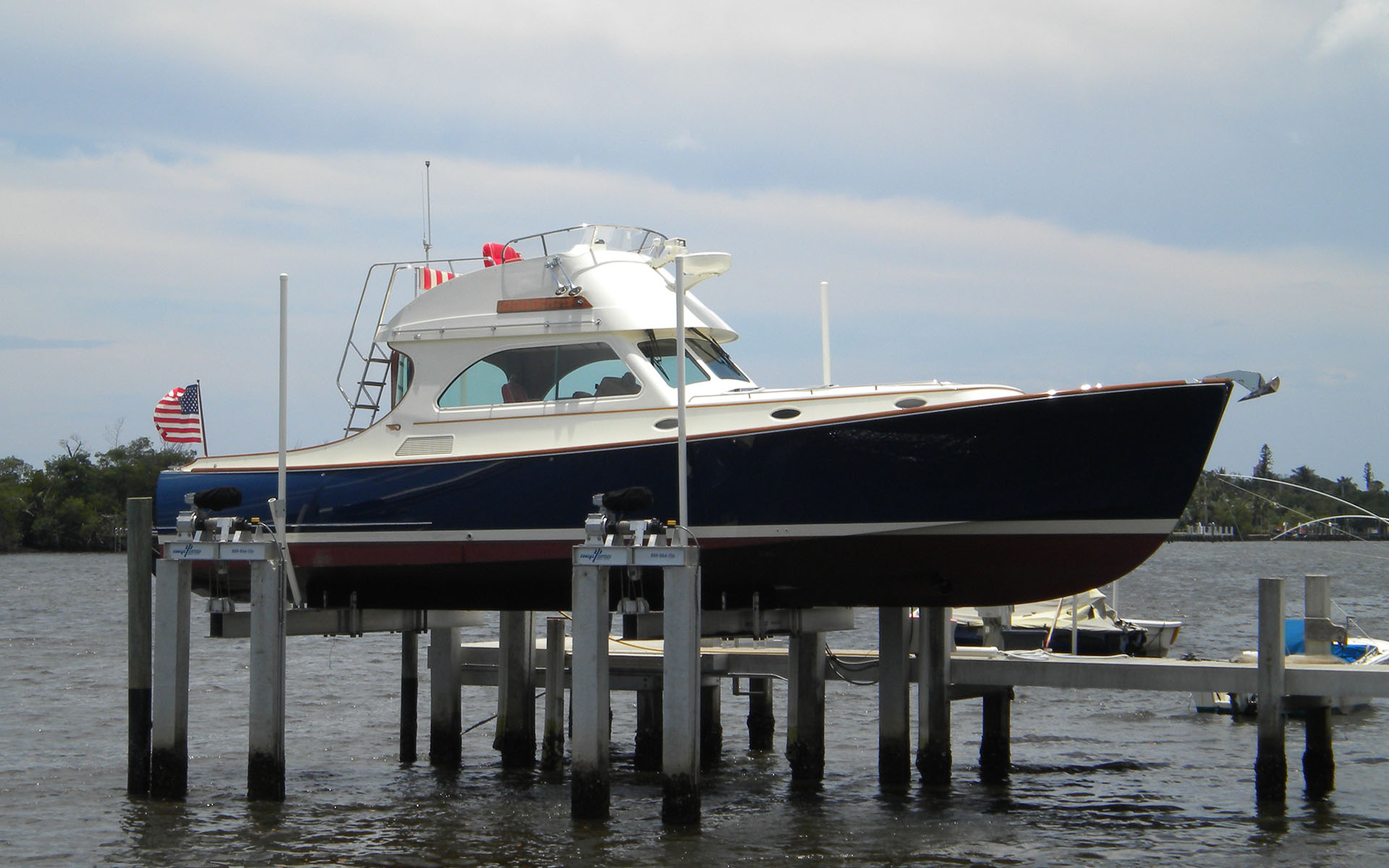 Luxury boat on an eight-post yacht lift